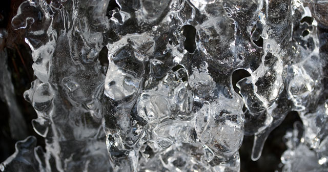 Ice buildup in front of small waterfall